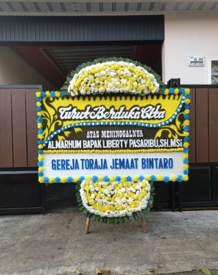 Papan Bunga Duka di Kota Karang